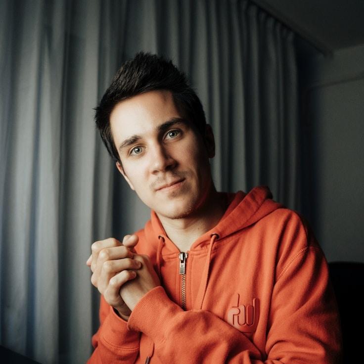 Jordan Liu, Client Relations Director, discussing corporate gifting strategy with business clients